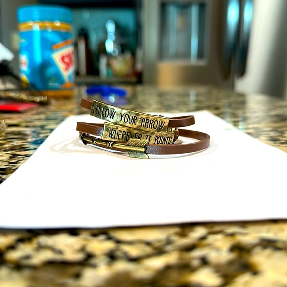 Jewelry - Leather bracelet with metal charms